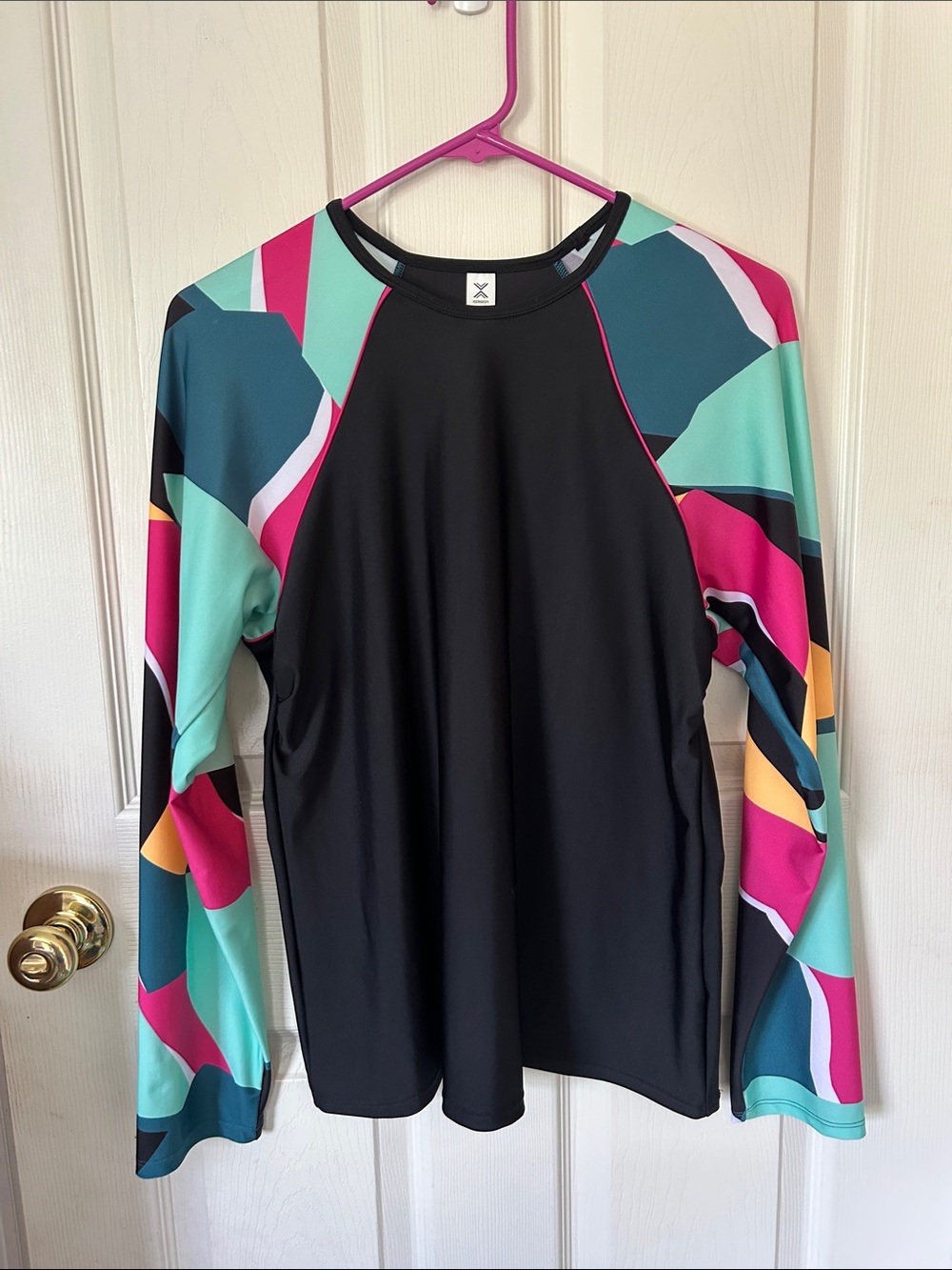 Xersion Black Swim Tee with Multicolor Geometric Sleeves
